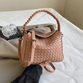 Pink woven leather crossbody bag with braided handle and adjustable shoulder strap - Pink