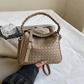Handwoven beige crossbody bag with premium leather texture and thick rounded handles - Khaki