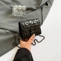 Mini black quilted chain crossbody bag with patent leather finish and metal clasp - Black