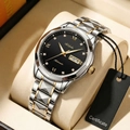 Detail of luxury two-tone steel watch with black dial and Roman numeral crystal markers - Men Two-tone Black