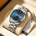 Detail of blue sunray dial quartz watch with gold pointers in a premium leather box - Men Two-tone Blue