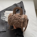 Brown fuzzy faux shearling Boston bag with leather handles and silver hardware - Chocolate