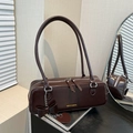 Dark brown faux leather shoulder bag with gold lettering and decorative heart pendant - Brown