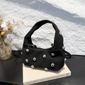 Black fabric hobo bag with bold silver metal studs and wide shoulder strap style - Black