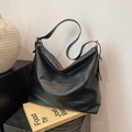 Minimalist black faux leather tote bag with lychee texture and silver metal buckle - Black