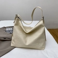 Minimalist beige hobo tote bag in soft pebble faux leather for casual commuting - White