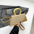 Minimalist cream and ochre crossbody bag with molten gold metal handle detail - Khaki