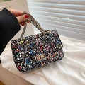 Bunte Graffiti-Umhängetasche aus Tweed mit goldener Kette und Metall-Drehverschluss - Blau
