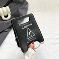 Chic black 'CAUTION' sign-shaped crossbody bag with silver bead chain for women - Black