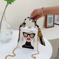 White box clutch with cartoon graphic, gold chain and silk scarf wrapped handle - White