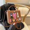 Brown faux leather crossbody bag with chic embroidery patches and diamond quilted stitching - Brown