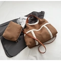 Detail of suede tote bag set with faux shearling trim and matching zipper pouch - Shoulder Bag Set / Brown