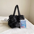 Quilted black puffer hobo bag with cloud-like pleats and wide shoulder strap - Black