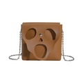 Brown PU leather crossbody bag with skull face cutout design and silver chain strap - Tan