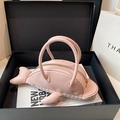 Chic pink whale-shaped crossbody bag with gold zipper and striped bottom detail - Handheld (No Chain) / Pink