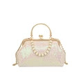 Elegant sequined evening clutch bag with pearl handle and golden chain in iridescent pink - Colorful