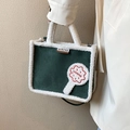 Borsa tote in peluche verde scuro con bordo in ecopelliccia bianca e ricamo - Verde