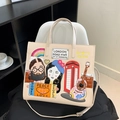 Beige tote bag in faux leather featuring quirky London-themed embroidery and patches - Off-white