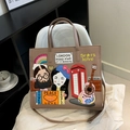 Brown vintage tote bag featuring British pop art embroidery and adjustable shoulder strap - Khaki