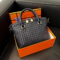 Dark blue woven leather handbag with shell structure and golden zipper detail - Black