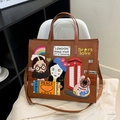 Brown retro leather tote with British pop art embroidery and adjustable shoulder strap - Tan