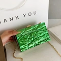 Metallic emerald green clutch bag with ice-crack texture and golden chain strap - Green