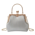 Elegante borsa a mano plissettata argento con manici in oro rosa e incisioni floreali - Argento
