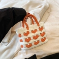 Handmade crochet mini tote bag in white with orange heart patterns and woven handles - Orange
