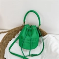 Vibrant green drawstring bucket bag in pebble leather with adjustable shoulder strap - Green