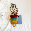 Handmade crochet phone bag featuring a colorful striped cartoon sausage mouth design - Sausage Lips Monster Style