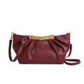 Pleated burgundy cloud clutch bag with gold ribbed metal handle and leather strap - Burgundy
