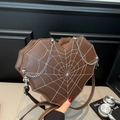 Dark brown heart-shaped crossbody bag with spider web embroidery and silver chains - Brown