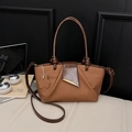 Retro brown leather handbag with pleated detail and adjustable shoulder strap - Mocha