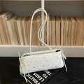 Borsa baguette bianca con motivi a stelle argentate e nodi a fiocco decorativi - Bianco Sporco