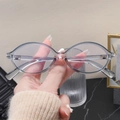 Detailed side view of translucent blue oval eyeglasses frame with model number 5553 detail - Anti-blue Light Lens / Smoke Gray