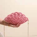 Pink shell-shaped woven crossbody bag with hollow straw pattern and gold chain strap - Pink