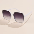 Detail of square oversized white sunglasses with gradient lenses and gold metal hinges - White Double Grey