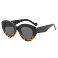 Retro oversized oval sunglasses with classic black and tortoiseshell patterned frames - Black with Tortoise Splice
