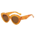 Retro oval sunglasses with bold orange leopard print frames and dark brown lenses - Orange Leopard