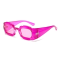 Unregelmäßige blütenblattförmige Sonnenbrille mit rosa Rahmen und getönten Gläsern - Rosarot Transparent