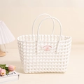 White woven hollow plastic tote bag with double handles for beach vacation and storage - White