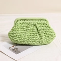 Light green pleated straw clutch bag with woven texture for beach and vacation style - Green
