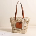 Borsa tote in paglia beige con manici in pelle marrone e un fiocco in pizzo bianco - Beige