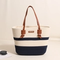 Blue and white striped cotton woven tote bag with brown faux leather handles and metal logo - Leather Knots And Cotton Thread Patchwork In Dark Blue