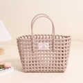 Pink hollow woven beach bag with dual handles and stylish minimalist front patch label - Gray