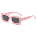 Trendy rectangular bright pink sunglasses with dark lenses in a retro Y2K fashion style - Pink Frame Grey Lens