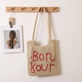 Schicke beige Stroh-Schultertasche mit roter Bonjour-Stickerei für Strand und Urlaub - Beige mit rotem Buchstaben