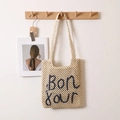 Handgefertigte beige Stroh-Tragetasche mit blauer Bonjour-Stickerei und langen Tragegriffen - Beige mit blauem Buchstaben