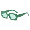 Modern square candy green thick frame sunglasses with matching lenses in a front view - Grass Green