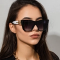 Fashionable oversized square sunglasses with black frames and gradient lenses on a model - Glossy Black (C01)